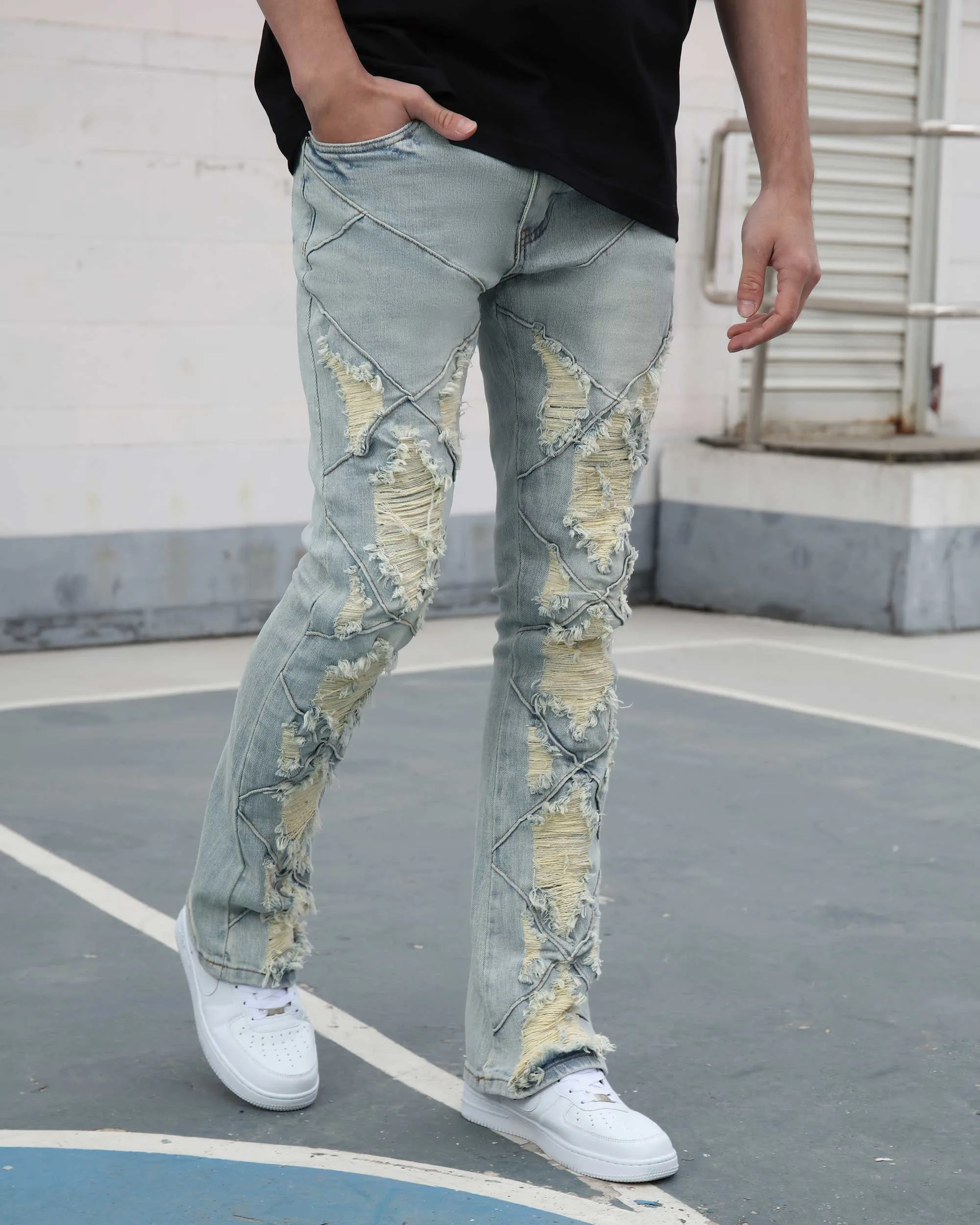Distressed Flared Blue Jeans with Large Ripped
